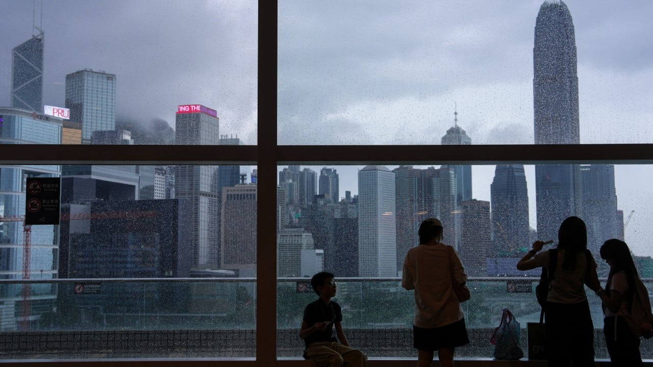 Hong Kong lowers red rainstorm warning to amber after morning class suspension