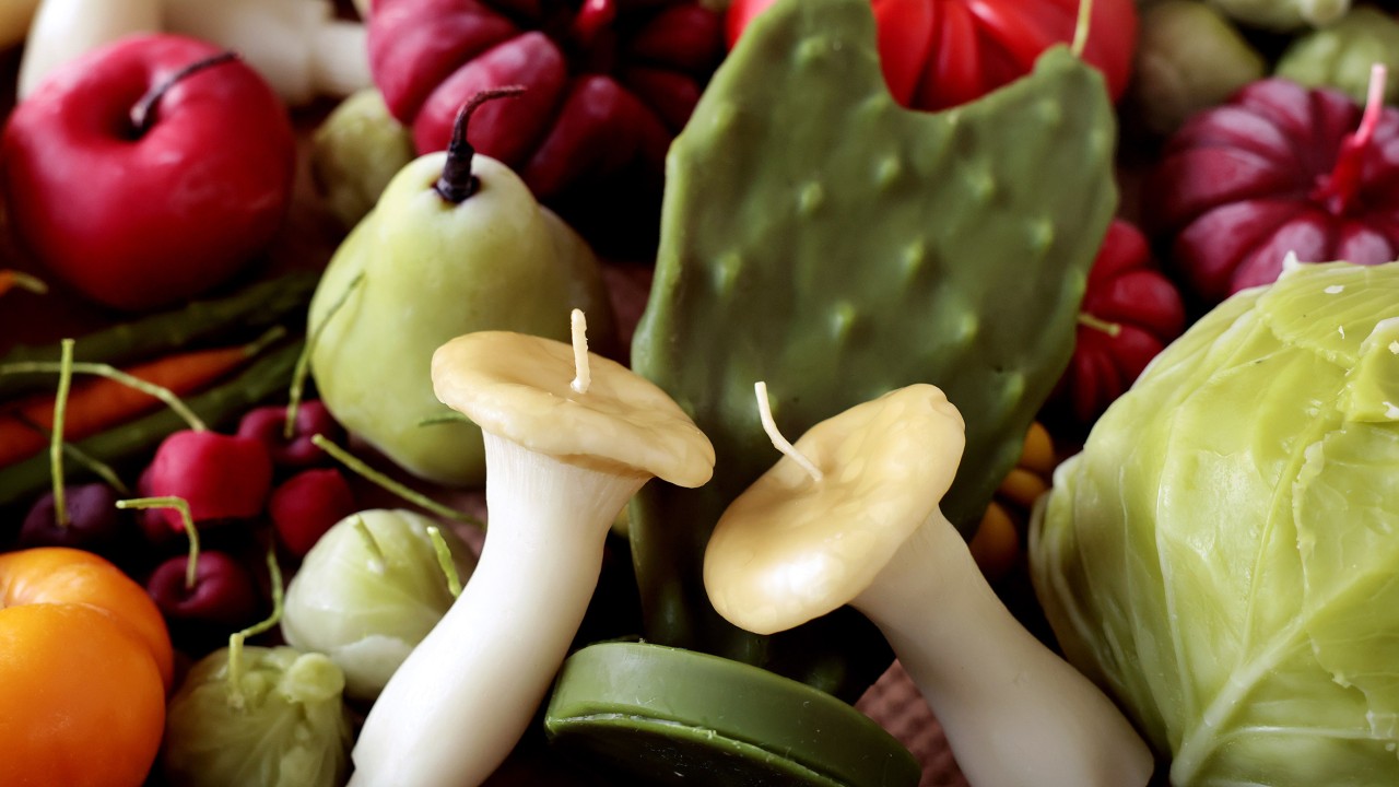 These beeswax candles shaped like fruit and vegetables look good enough to eat