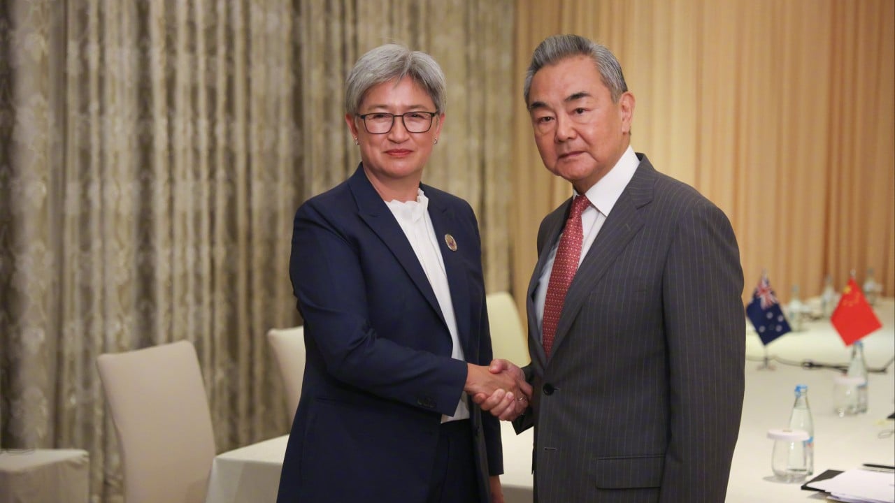 Australia raises China’s missile test in meeting with top diplomat Wang Yi