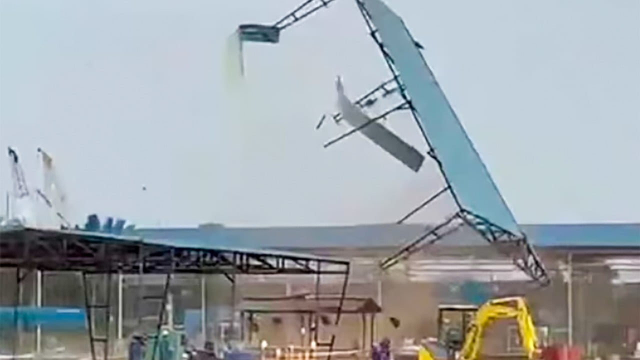 Tornado rips roofing from Indonesian construction site, sends workers fleeing