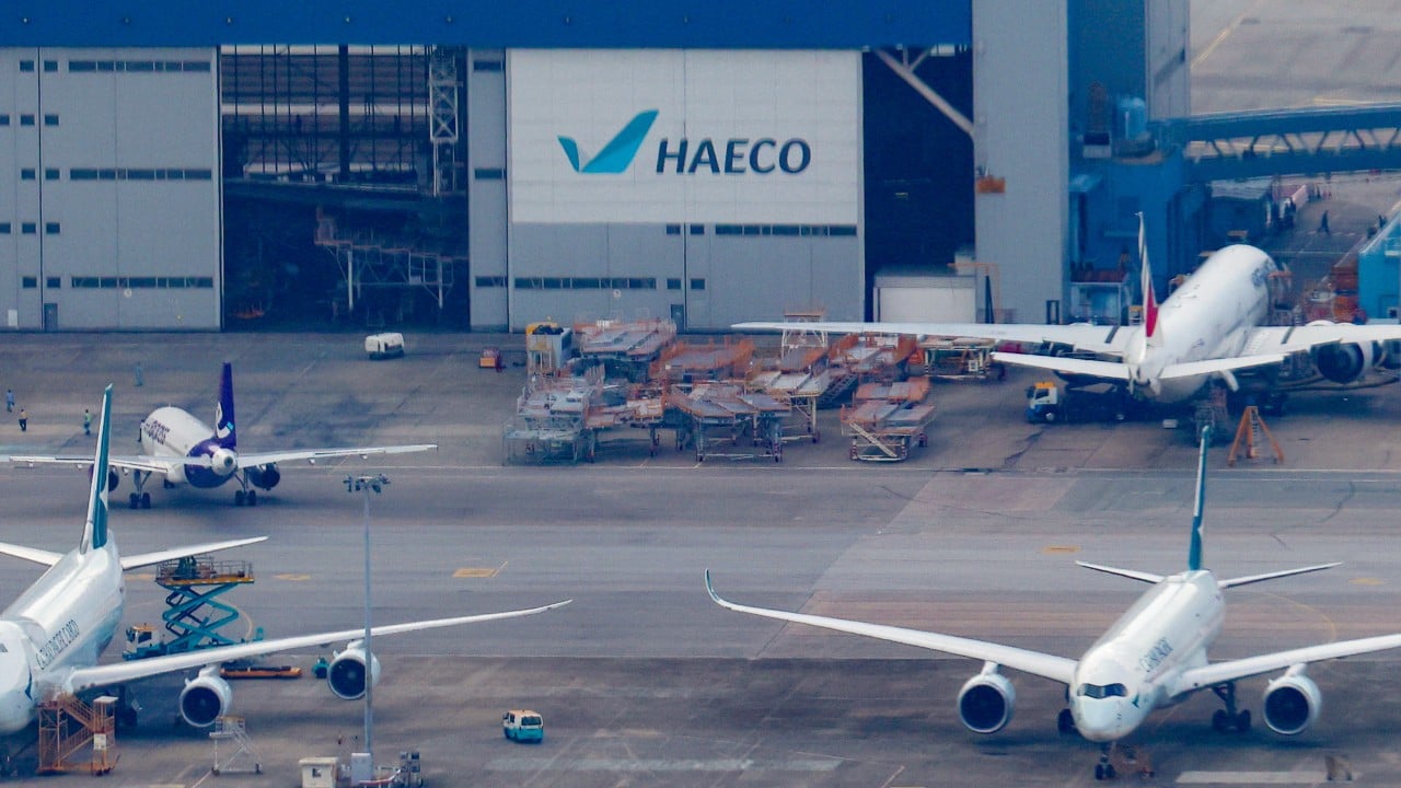 Worker, 62, dies after falling from platform while repairing plane at Hong Kong airport
