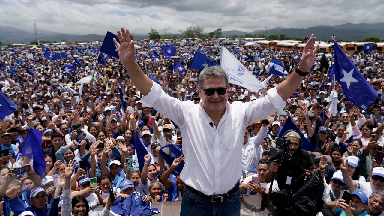 Pardoned by Trump, ex-president Hernandez returns to Honduras