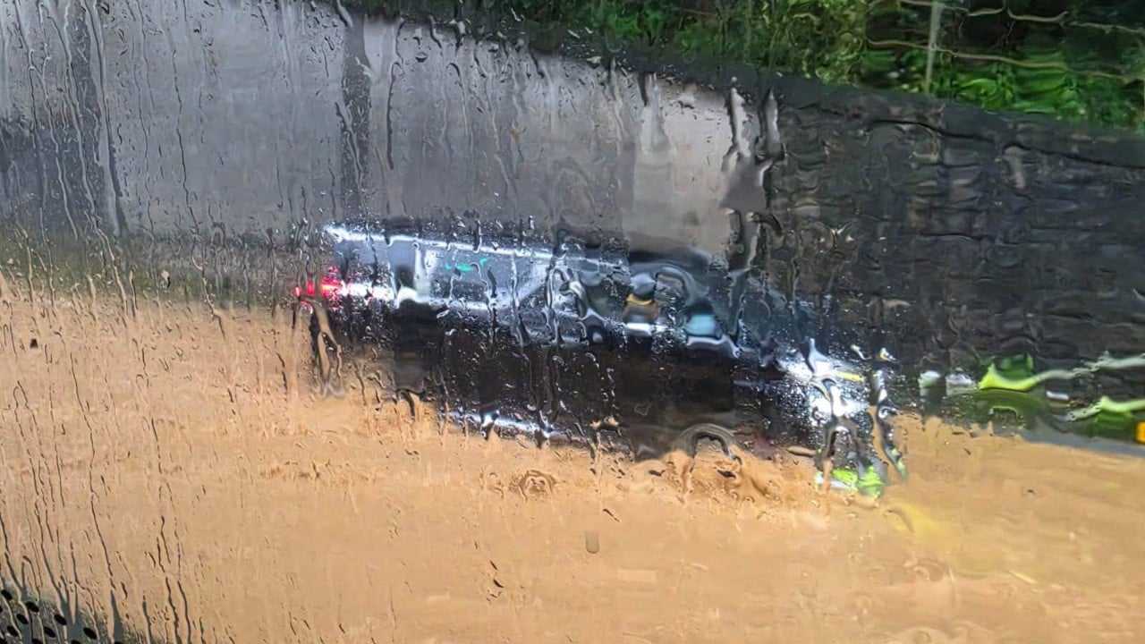 Drivers struggle through floods in Hong Kong’s New Territories amid heavy rain