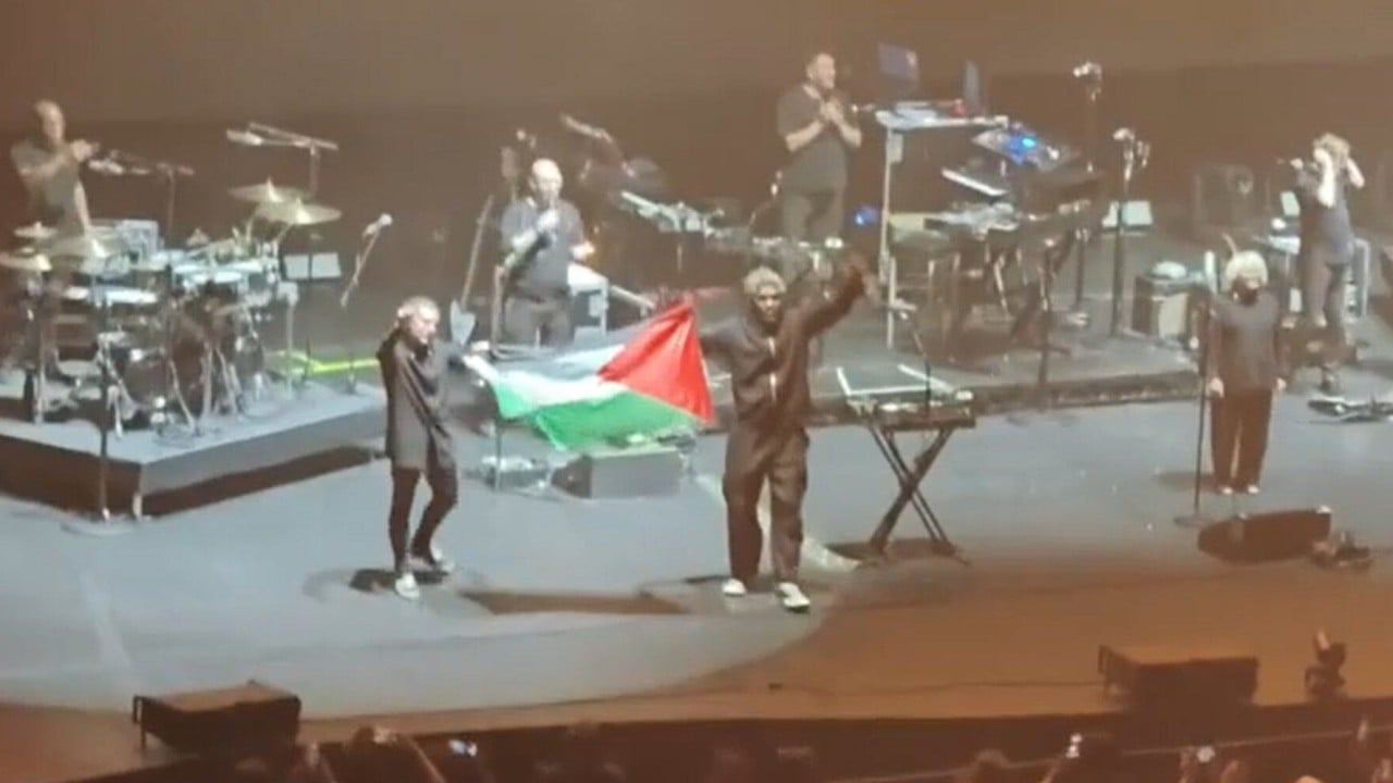 Massive Attack barred from Singapore for unfurling Palestinian flag on stage