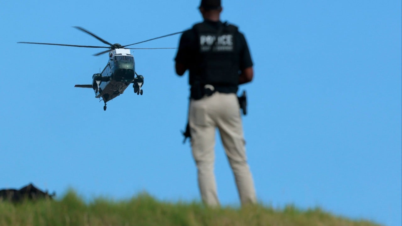 Man with gun in car arrested at Trump golf course before US president’s visit