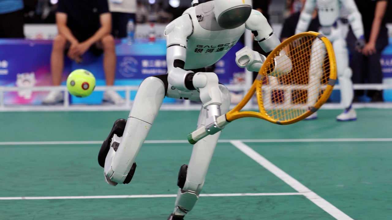 Chinese robots tackle tennis, smash track records at World Humanoid Robot Games