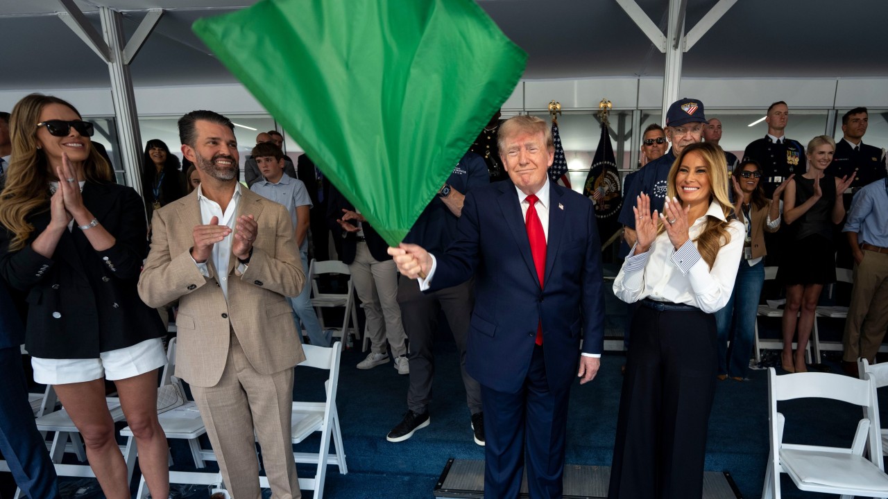Trump takes starring role at Washington’s IndyCar debut