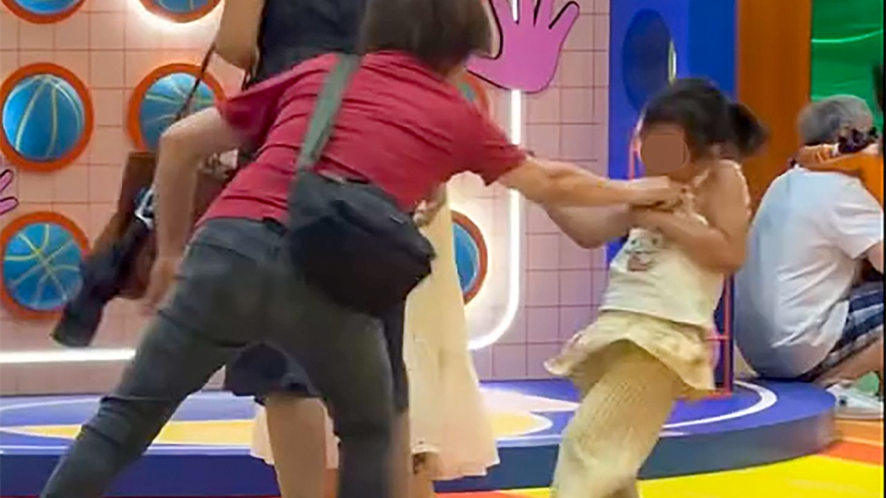 2 arrested in Hong Kong fight over elderly woman slapping girl