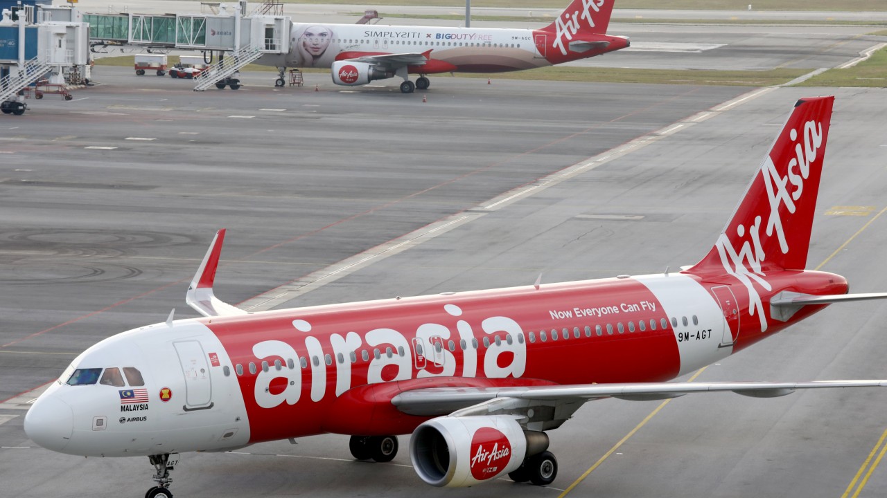 Malaysian airport staff find body in wheel well of plane from Japan