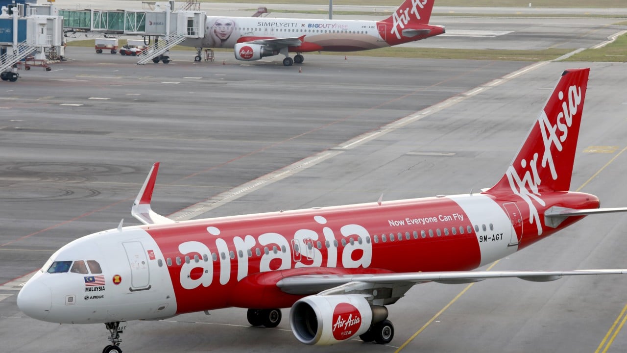 Malaysian airport staff find body in wheel well of plane from Japan
