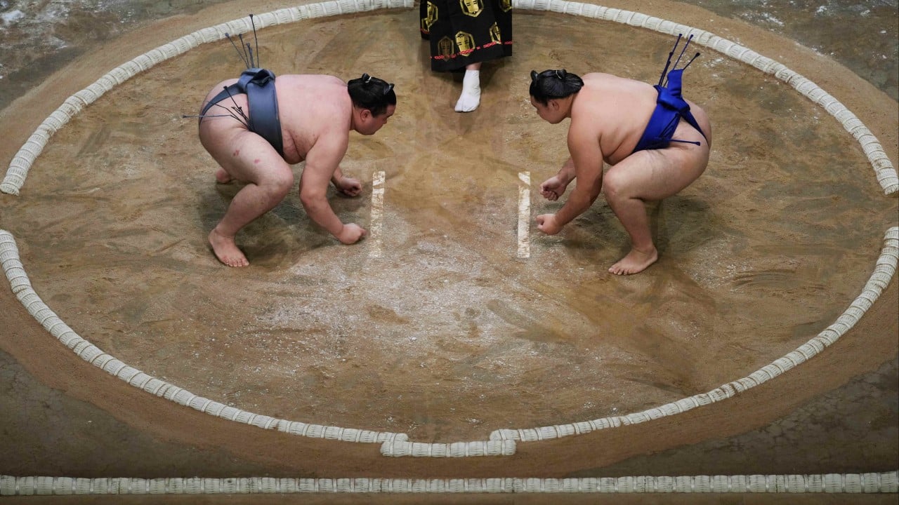 Japan’s sumo chiefs trim tour dates, demand air con to beat summer heat