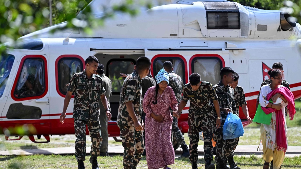 Nepal army races to rescue 100 trapped in hydropower tunnel after flash floods