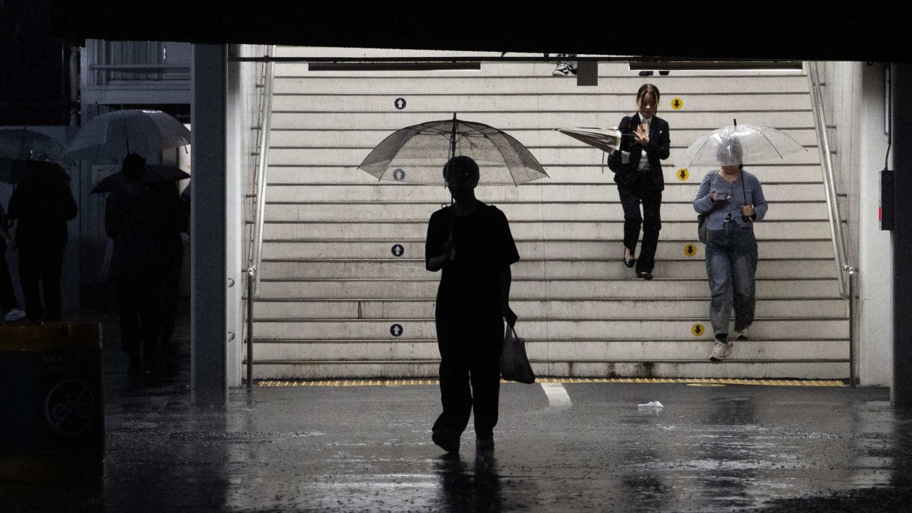 Woman found dead in submerged car in Japan amid record rainfall