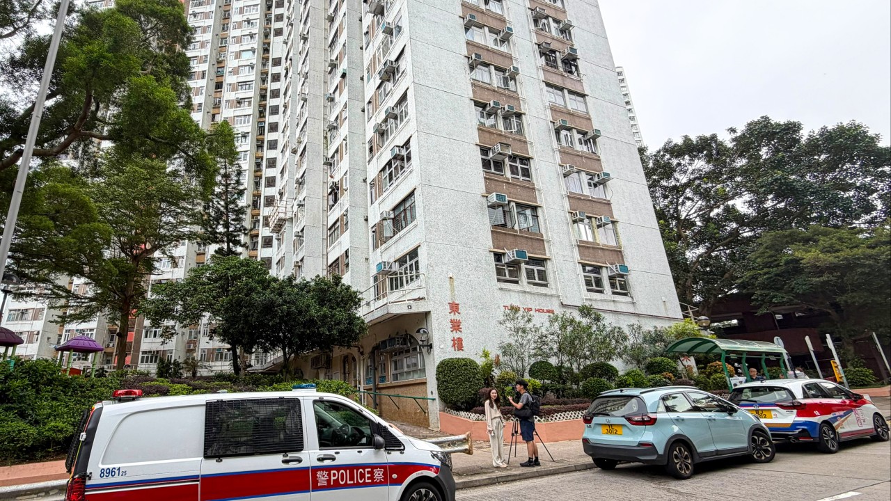 Police open investigation after 2 men found dead at Hong Kong public flat
