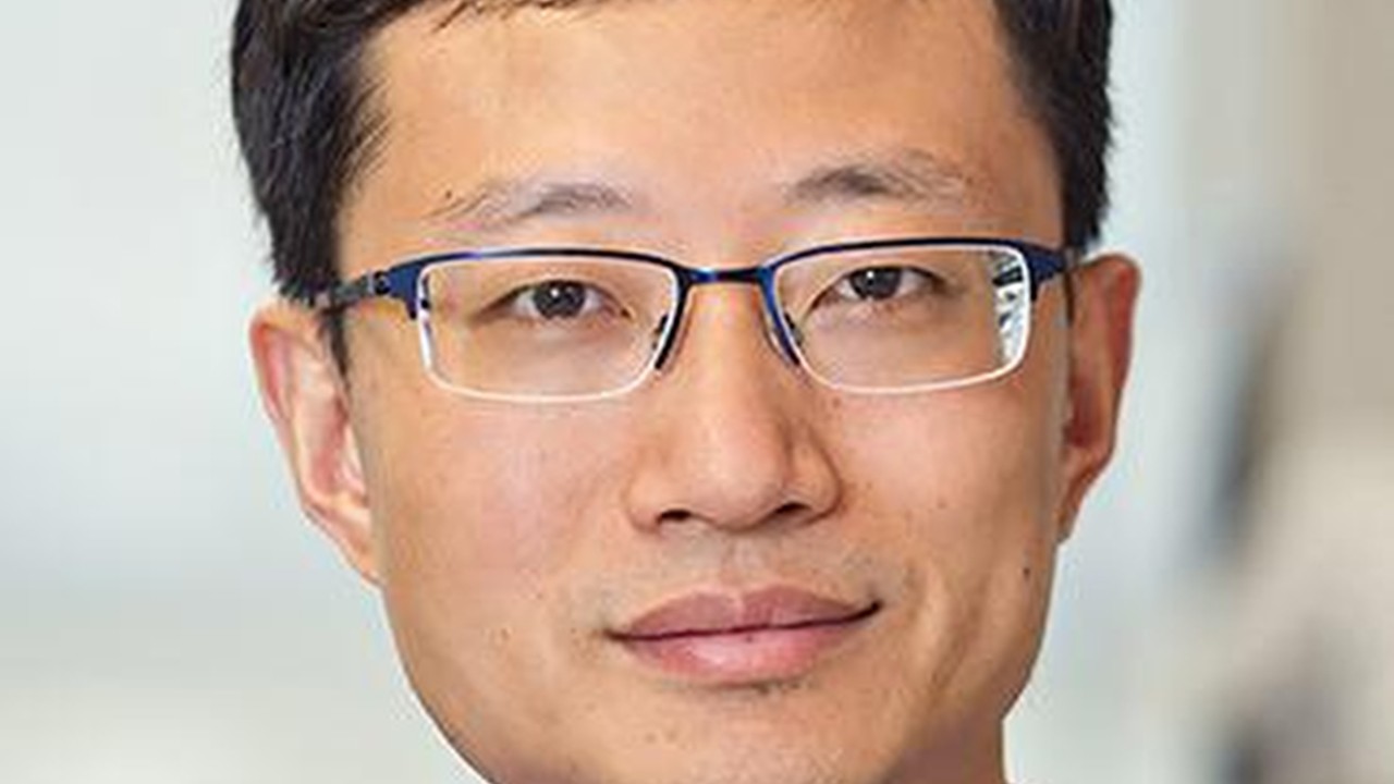 Neurobiologist Ye Bing says his return to China is not spurred by Michigan campus tragedy