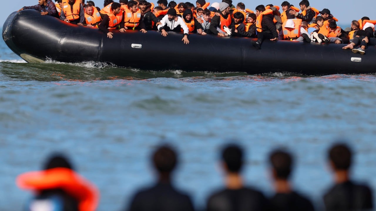 UK far-right activist arrested after migrant boat slashed in English Channel