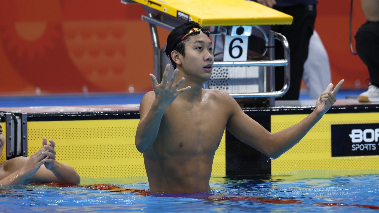 Chinese teen titan Zhang Zhanshuo counts out the golds after magnificent 7 at Asian Games