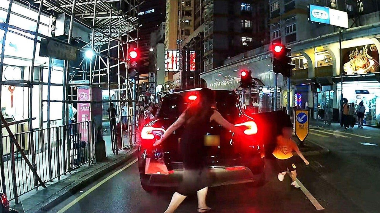 Woman arrested over child abuse in Hong Kong after dashcam video shows boy shoved