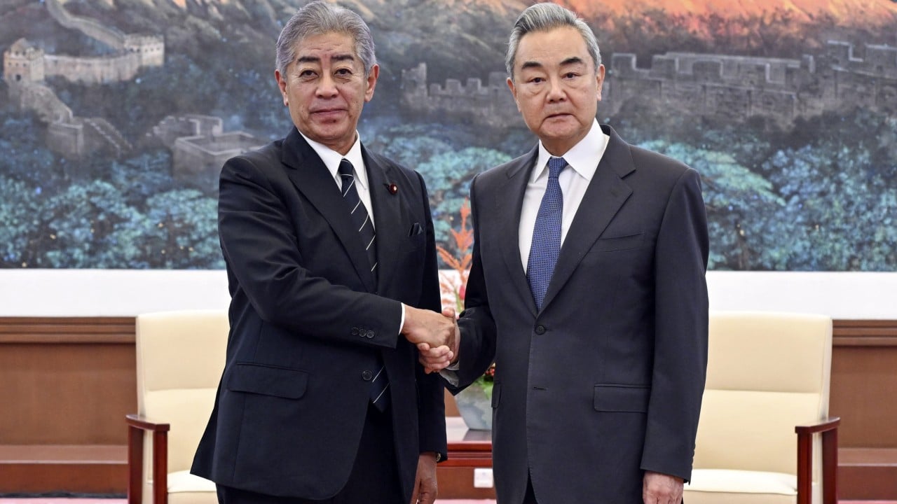 China warns Japan over WWII history as business delegation visits Beijing