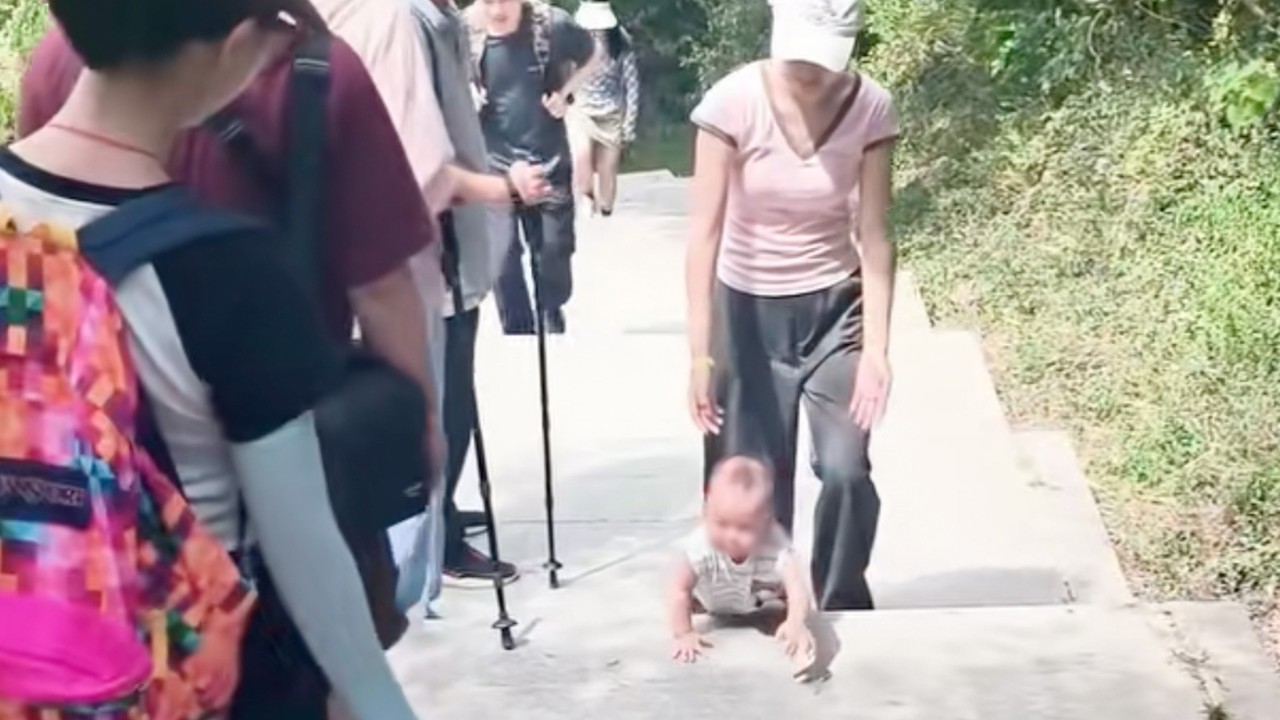 Viral video of 9-month-old Chinese baby climbing mountain steps sparks safety concerns