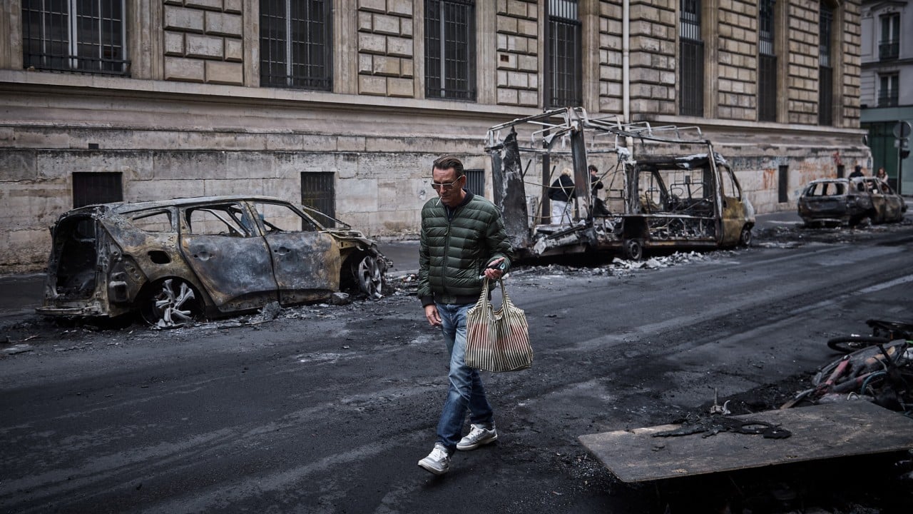 France imposes curfews in Paris and major cities after worst riots in years