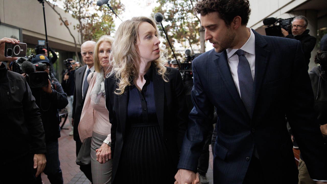 Meet Elizabeth Holmes’ partner, Billy Evans, who appears fully nude in documentary You Can See Everything