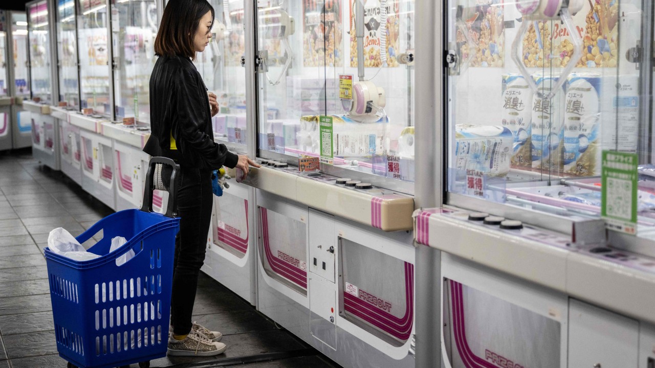 Inflation-squeezed Japanese flock to claw machines dangling everyday items