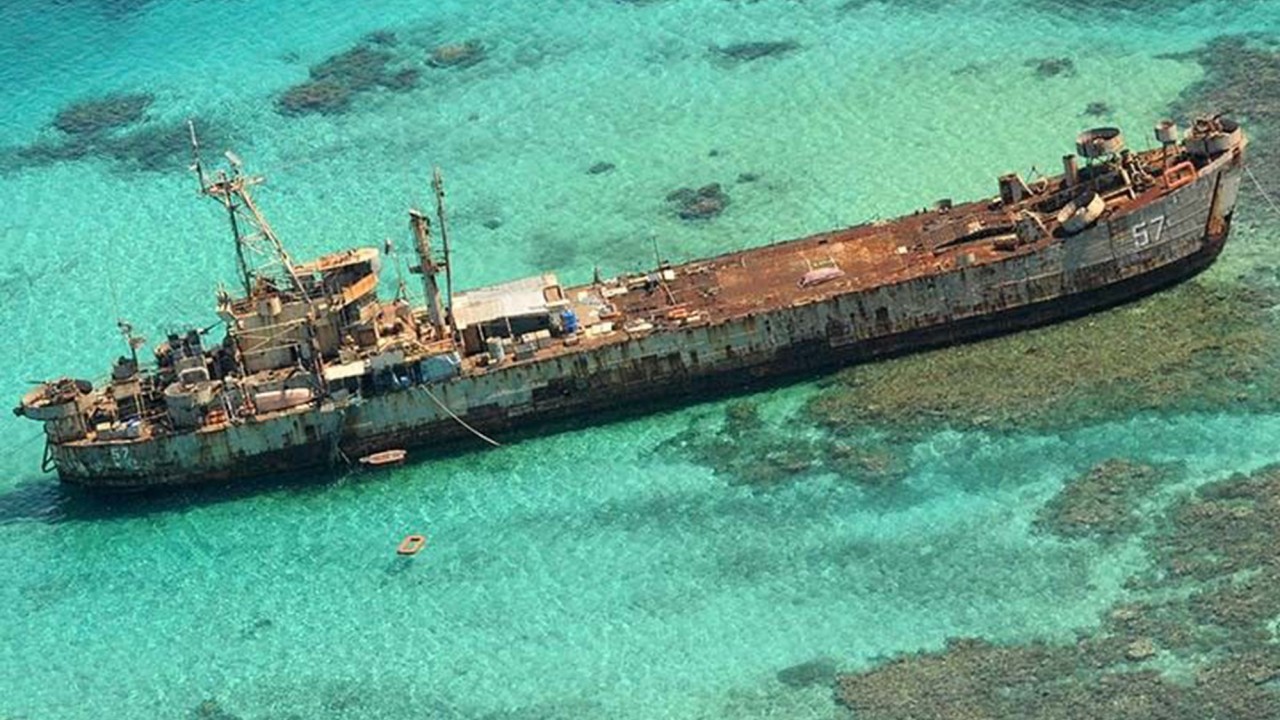 China says it allowed Philippines to resupply warship amid diplomatic tensions