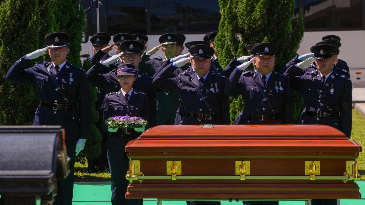 Hong Kong constable paralysed in 2005 knife attack laid to rest with full honours