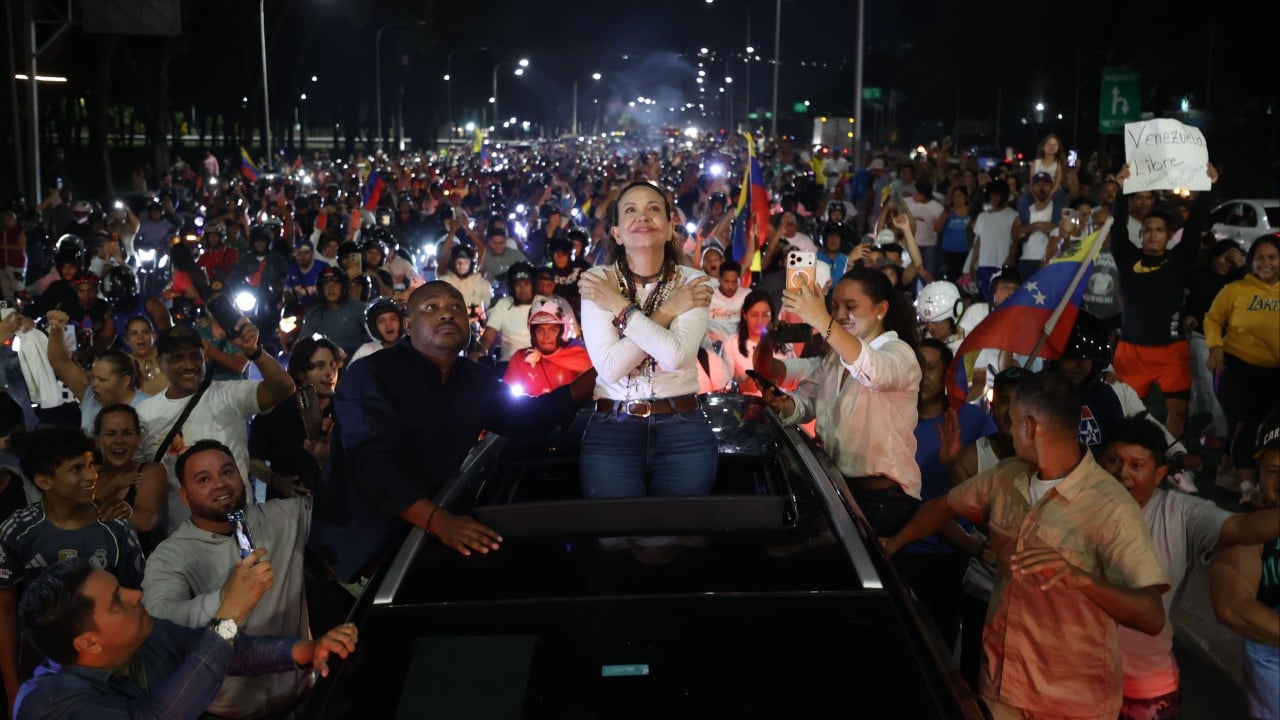 Machado makes dramatic return to Venezuela after nearly a year in exile