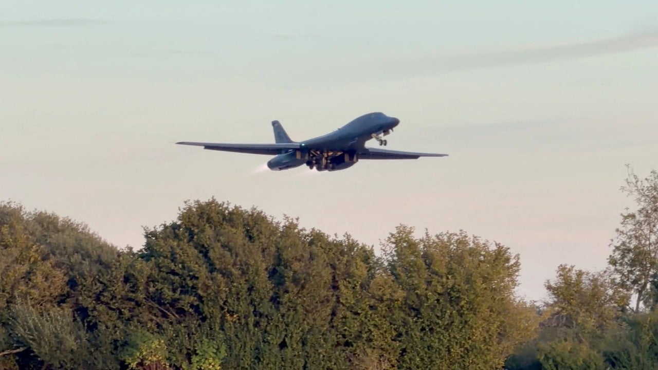 2 men charged in UK with helping Iran over air force base incident