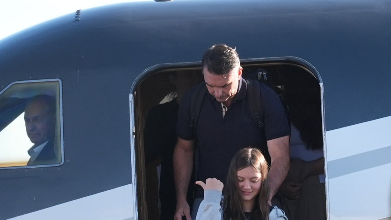 Defeated Brazilian presidential candidate Flavio Bolsonaro and his family land in Miami
