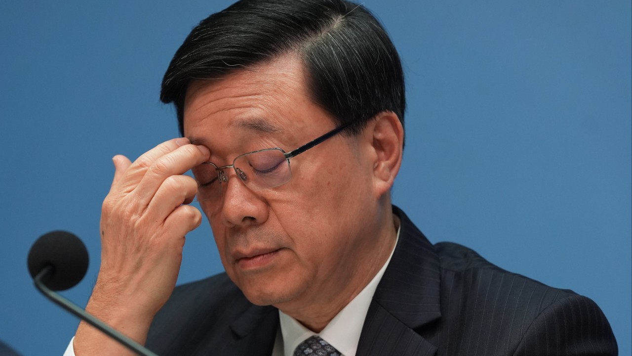 Lee vows to stay on, says housing minister’s resignation his ‘political decision’