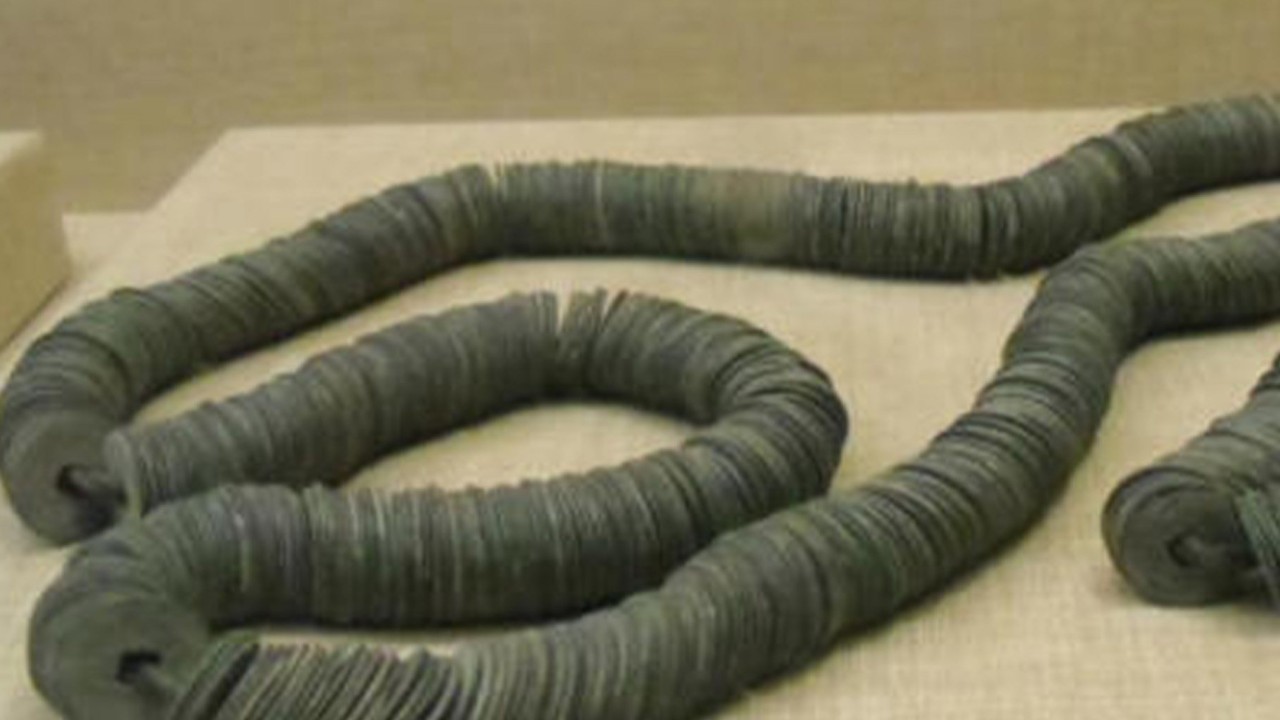 What’s the true worth behind Chinese phrase ‘carrying 10,000 strings of cash around the waist’
