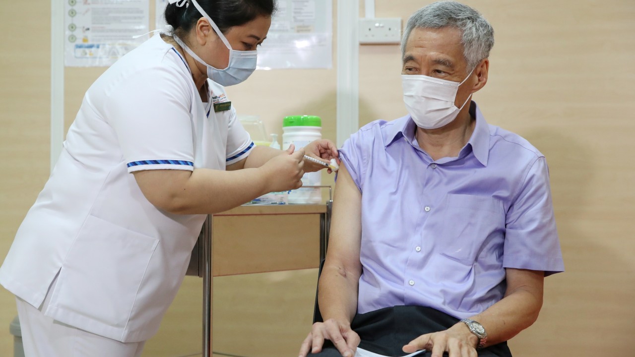 Singapore PM gets his first coronavirus vaccine dose; Japan battles to contain spread