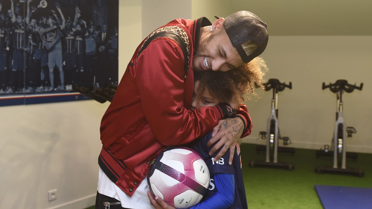 Neymar and Paris Saint-Germain make a young fan’s dream come true after he follows the Brazilian around the world to meet him