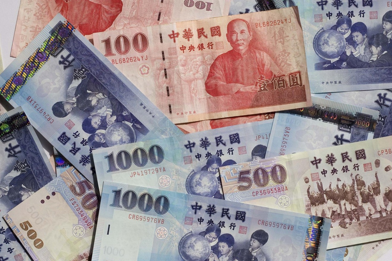 Taiwan corporate debt limits seen curbing currency speculation | South  China Morning Post
