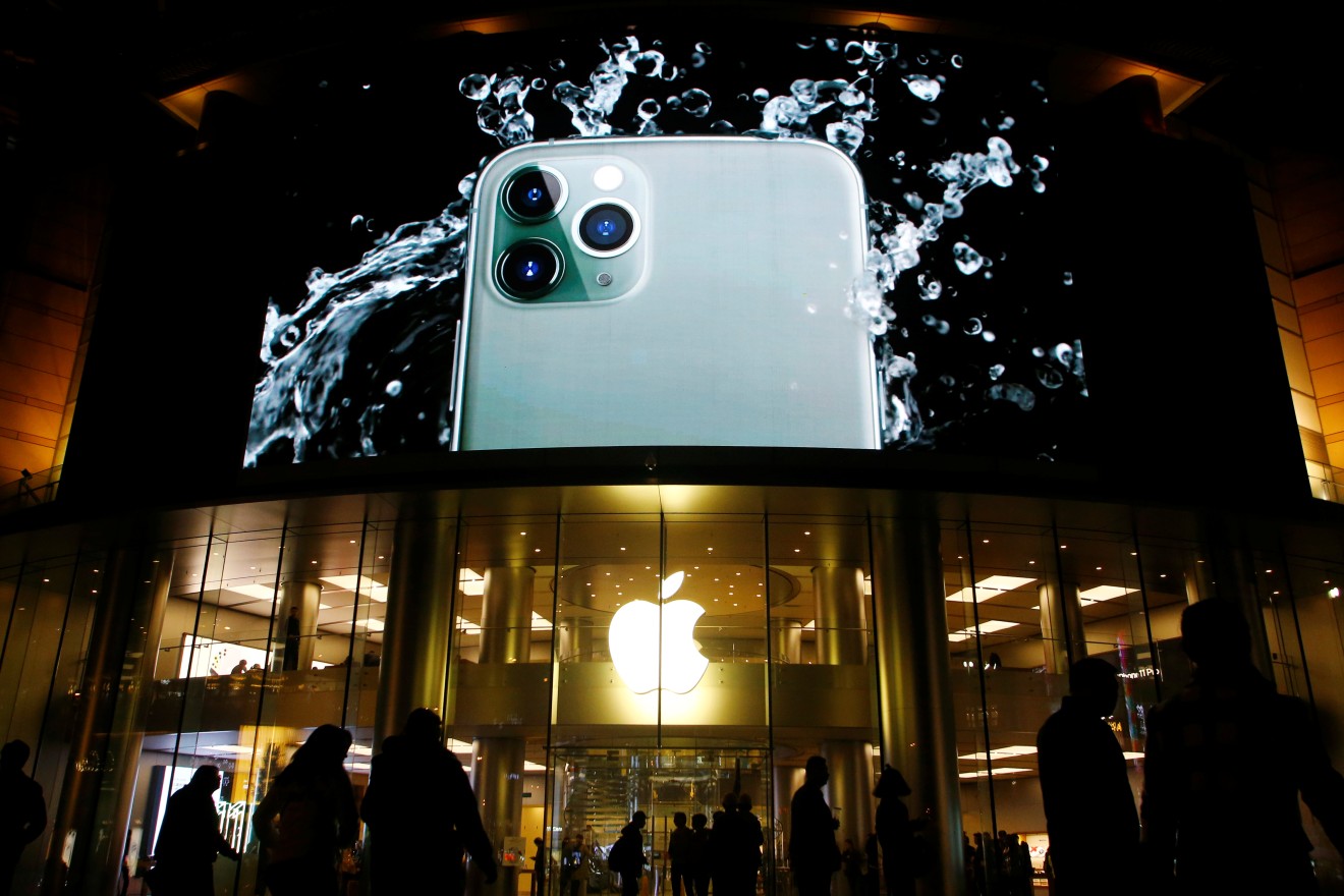 Despite the ridicule, the iPhone 11 recorded pretty decent sales in China, even without 5G. (Picture: Florence Lo/Reuters)