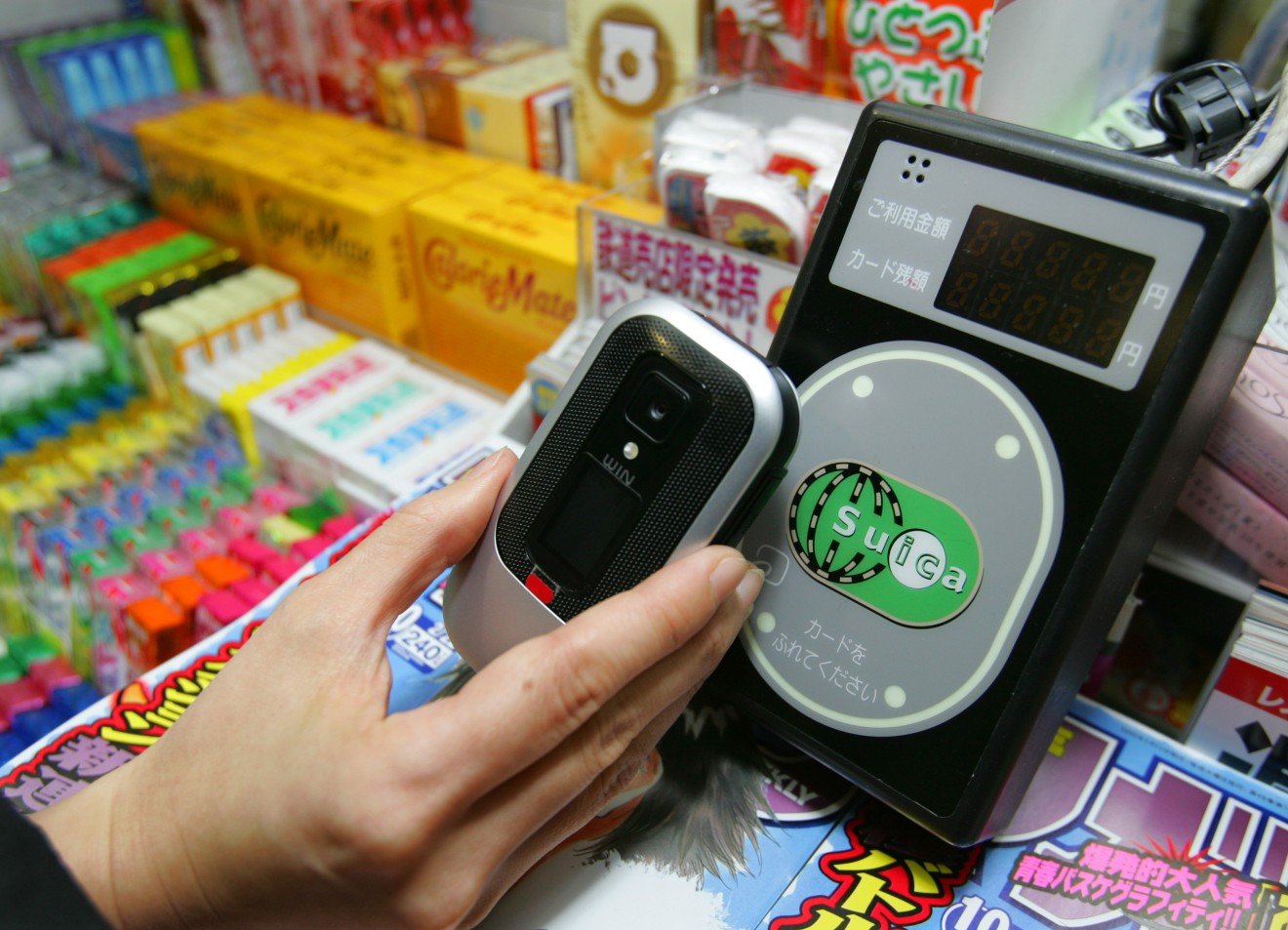 Suica uses the same NFC tech as Octopus. (Picture: Itsuo Inouye/AP)