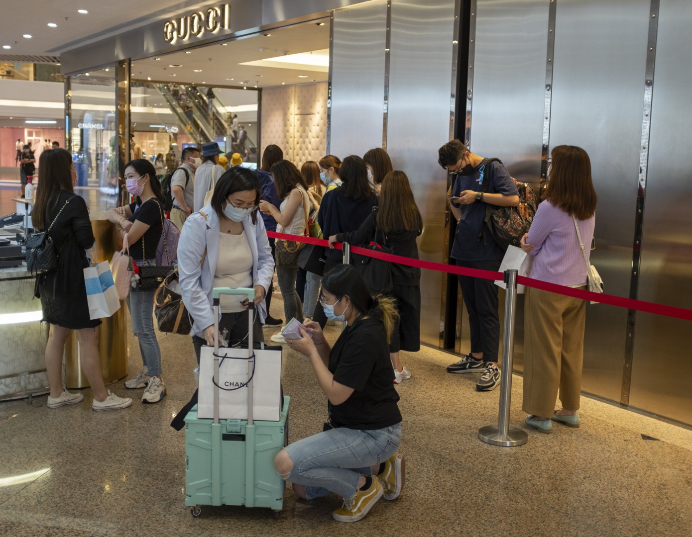 Gucci, Ralph Lauren and other labels join voucher schemes at ...