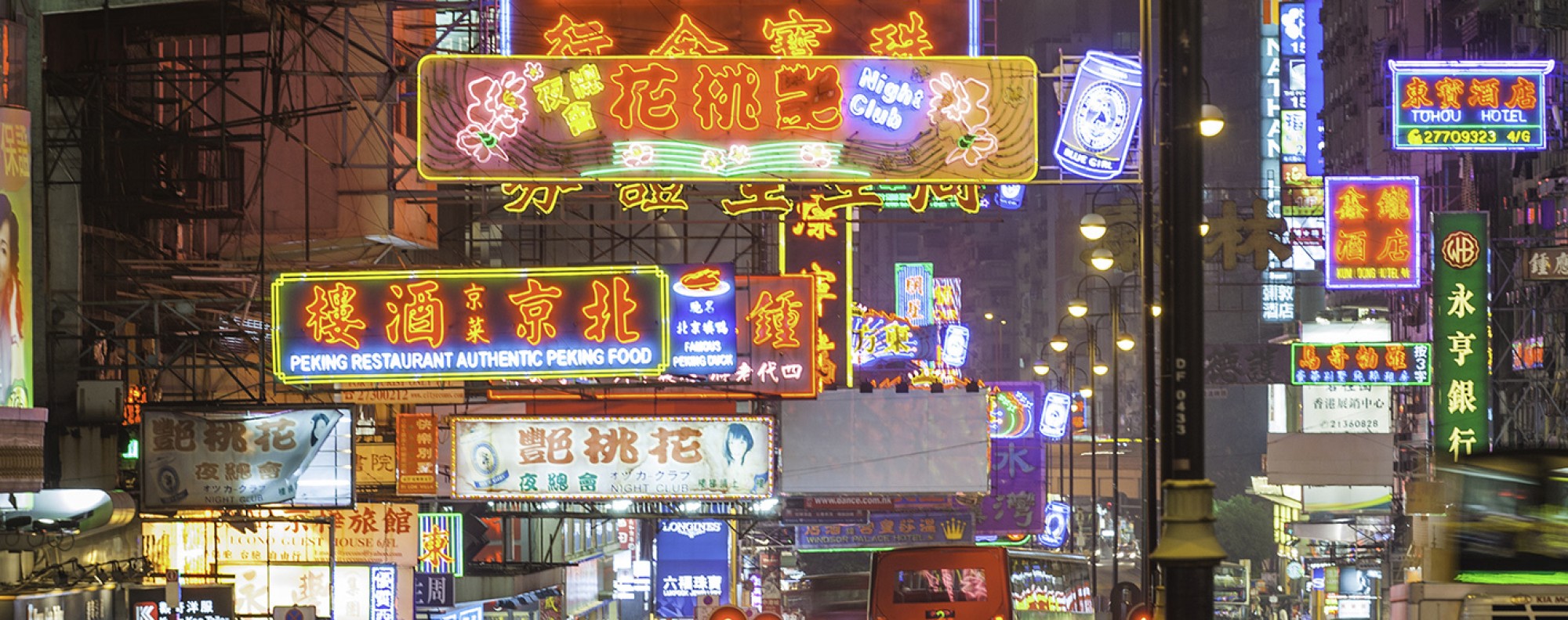 Neon signs in Tsim Sha Tsui, Hong Kong. Photo: Getty Images