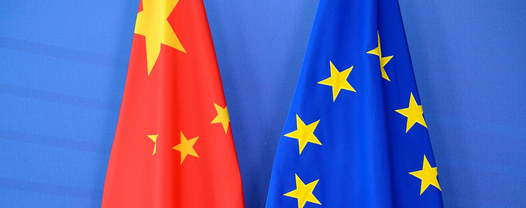 The Chinese flag is draped beside the European Union flag during a EU-China Summit at the European Union Commission headquarters in Brussels. Photo: AFP