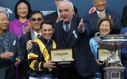 Silvestre de Sousa collects his trophy for winning the Hong Kong Cup aboard Glorious Forever. Photos: Kenneth Chan
