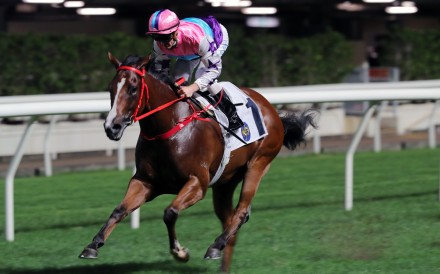Gorgeous Vitality salutes under Zac Purton at Happy Valley on Wednesday night. Photo: Kenneth Chan