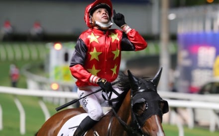 Ruan Maia looks to the heavens after Cordyceps One’s win at Happy Valley. Photos: Kenneth Chan