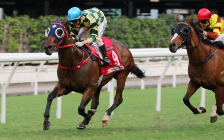 Rewarding Together salutes under Matthew Chadwick at Happy Valley on Sunday. Photo: Kenneth Chan