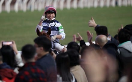Dylan Mo enjoys the winning feeling after Packing Treadmill’s Class Two Poinsettia Handicap (1,600m) victory at Sha Tin on Saturday. Photo: Kenneth Chan