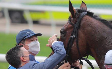 Douglas Whyte gives Russian Emperor a pat after his Champions & Chater Cup win last year. Photos: Kenneth Chan