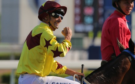Alberto Sanna celebrates a victory aboard the Caspar Fownes-trained Southern Legend. Photo: Kenneth Chan