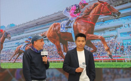Trainer John Size and owner Patrick Kwok discuss Beauty Eternal’s Hong Kong Derby chances at Sha Tin on Thursday. Photo: Kenneth Chan